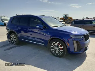 2023 Cadillac XT6 AWD Sport with VIN 1GYKPHRSXPZ117852, listed as a Copart auction lot 47895715 with 61,169 mi miles and Salvage title. Bid and sale history available at DreamBid. Image 4.