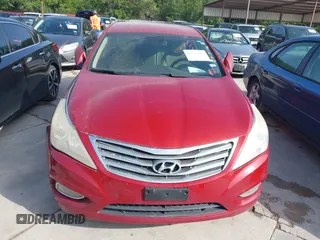2013 Hyundai Azera z VIN KMHFG4JG4DA253875, wystawiony jako IAAI lot #42773889 z przebiegiem 188 528 mil mil oraz . Historia ofert i sprzedaży dostępna na DreamBid. Obrazek 6.