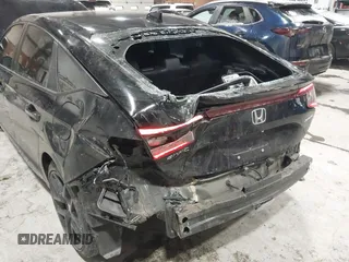 2023 Honda Civic Sport z VIN 19XFL2H85PE007244, wystawiony jako IAAI lot #41572024 z przebiegiem 21 182 mil mil oraz . Historia ofert i sprzedaży dostępna na DreamBid. Obrazek 6.