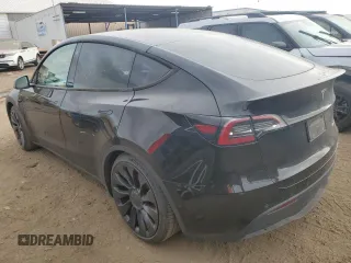 2022 Tesla Model Y Performance with VIN 7SAYGDEF3NF546385, listed as a Copart auction lot 83784984 with 30,769 mi miles and Salvage Title. Bid and sale history available at DreamBid. Image 2.
