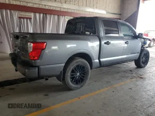 2018 Nissan Titan SV with VIN 1N6AA1E57JN515817, listed as a Copart auction lot 65537205 with 69,567 mi miles and Salvage title. Bid and sale history available at DreamBid. Image 3.