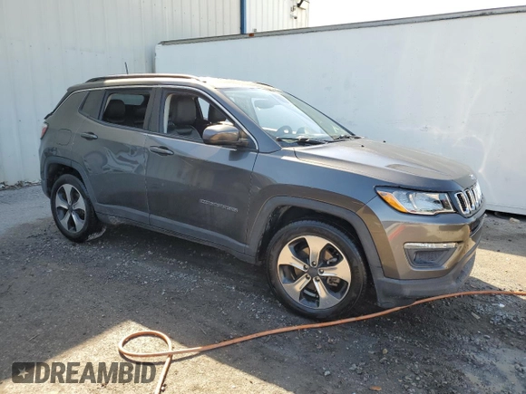 2017 Jeep Compass Latitude with VIN 3C4NJCBB6HT669441, listed as a Copart auction lot 49225475 with 61,568 mi miles and Salvage title. Bid and sale history available at DreamBid. Image 4.