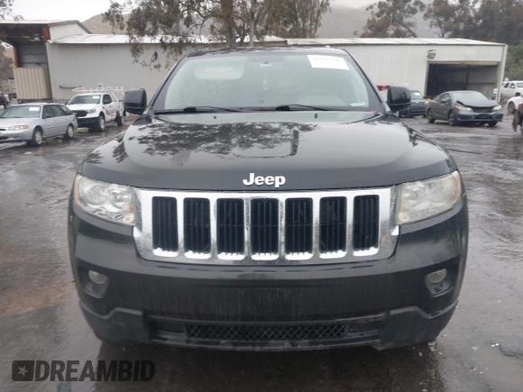 2011 Jeep Grand Cherokee Laredo z VIN 1J4RR4GG1BC566381, wystawiony jako IAAI lot #41547199 z przebiegiem 215 157 mil mil oraz . Historia ofert i sprzedaży dostępna na DreamBid. Obrazek 12.