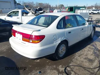 2002 Saturn LS z VIN 1G8JS54F62Y552871, wystawiony jako IAAI lot #41309003 z przebiegiem 124 216 mil mil oraz . Historia ofert i sprzedaży dostępna na DreamBid. Obrazek 4.