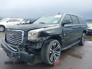 2019 GMC Yukon XL SLT with VIN 1GKS1GKC7KR155668, listed as a IAAI auction lot 41751792 with 163,537 mi miles. Bid and sale history available at carsss.com. Image 6.