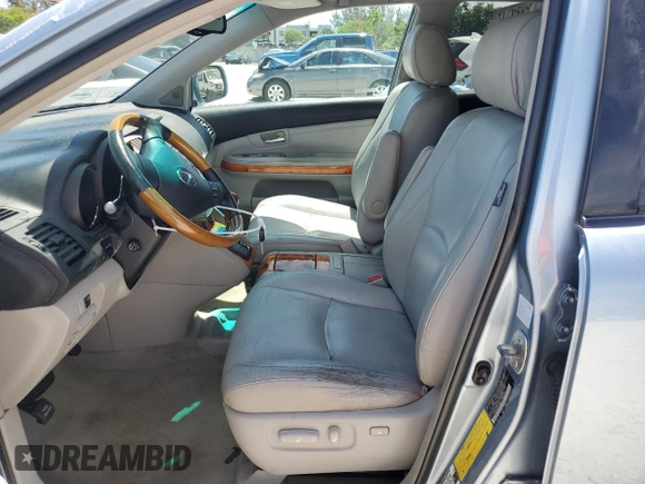 2007 Lexus RX 350 z VIN 2T2HK31U07C008868, wystawiony jako Copart lot #60669485 z przebiegiem 153 186 mil mil oraz Szkoda całkowita • Salvage title. Historia ofert i sprzedaży dostępna na DreamBid. Obrazek 7.