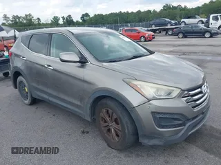 2014 Hyundai Santa Fe with VIN 5XYZT3LB7EG202820, listed as a IAAI auction lot 42816380 with 161,085 mi miles and . Bid and sale history available at DreamBid. Image 1.