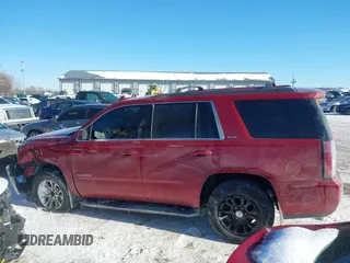 2015 GMC Yukon SLE with VIN 1GKS2AKC2FR514005, listed as a IAAI auction lot 41292783 with 129,413 mi miles. Bid and sale history available at carsss.com. Image 14.