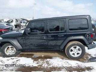 2022 Jeep Wrangler Unlimited Sport S with VIN 1C4HJXDN3NW132849, listed as a IAAI auction lot 41611023 with 47,770 mi miles. Bid and sale history available at carsss.com. Image 14.
