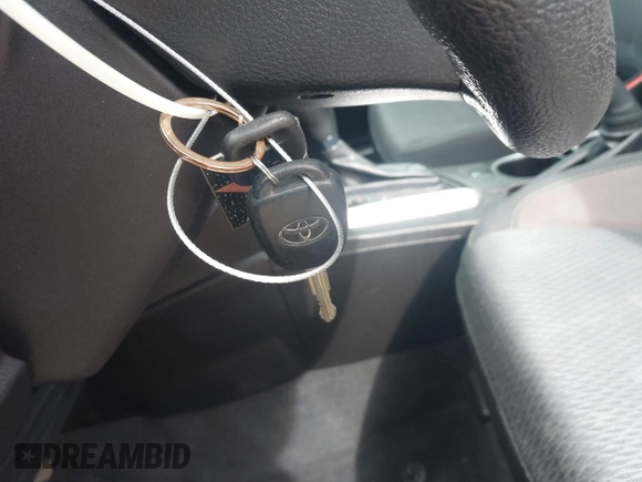 2019 Toyota Corolla L with VIN 5YFBURHEXKP882871, listed as a IAAI auction lot 41747710 with 104,117 mi miles. Bid and sale history available at carsss.com. Image 11.