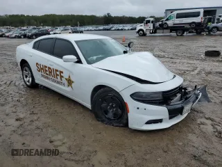 2019 Dodge Charger Police with VIN 2C3CDXAG3KH547577, listed as a Copart auction lot 79106194 with 81,077 mi miles and Salvage Title. Bid and sale history available at DreamBid. Image 4.