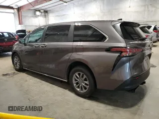 2021 Toyota Sienna XLE с VIN 5TDYSKFC8MS012409, выставлен на аукционе Copart как лот 57870055 с пробегом 82 107 миль миль и Списание • Salvage title. История ставок и продаж доступна на DreamBid. Изображение 2.