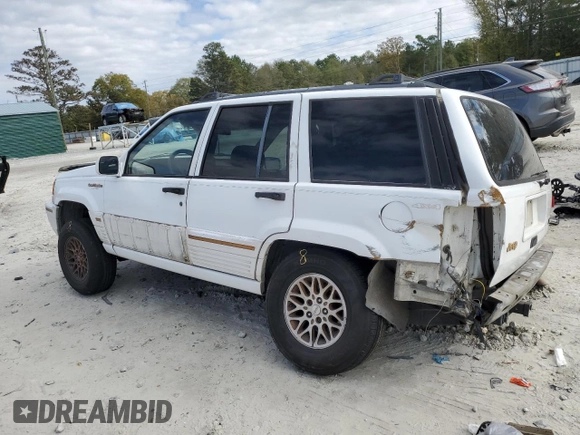 1995 Jeep Grand Cherokee Limited with VIN 1J4GZ78Y2SC788413, listed as a Copart auction lot 80297444 with 309,566 mi miles and Salvage Title. Bid and sale history available at carsss.com. Image 2.