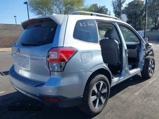 2018 Subaru Forester Limited with VIN JF2SJARC4JH435231, listed as a IAAI auction lot 42011028 with 51,901 mi miles. Bid and sale history available at carsss.com. Image 4.