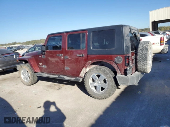2010 Jeep Wrangler Unlimited Sahara with VIN 1J4BA5H1XAL196555, listed as a Copart auction lot 76704534 with 112,365 mi miles and Salvage Title. Bid and sale history available at carsss.com. Image 2.