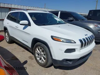 2015 Jeep Cherokee Latitude with VIN 1C4PJLCSXFW580566, listed as a IAAI auction lot 42051769 with 159,899 mi miles. Bid and sale history available at carsss.com. Image 1.