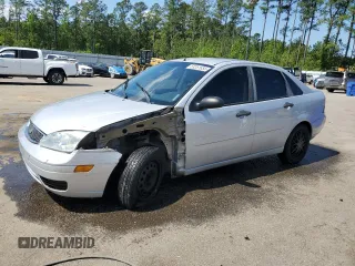 2007 Ford Focus S z VIN 1FAFP34N97W264411, wystawiony jako Copart lot #53251655 z przebiegiem 159 516 mil mil oraz Szkody całkowita. Historia ofert i sprzedaży dostępna na DreamBid. Obrazek 1.