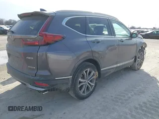 2020 Honda CR-V Touring with VIN 2HKRW2H91LH605995, listed as a IAAI auction lot 41672787 with 50,151 mi miles and . Bid and sale history available at DreamBid. Image 4.
