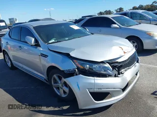 2015 Kia Optima LX with VIN 5XXGM4A77FG431285, listed as a IAAI auction lot 38792800 with 99,378 mi miles and . Bid and sale history available at DreamBid. Image 1.