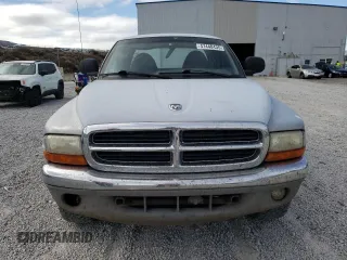 1999 Dodge Dakota SLT with VIN 1B7GG22Y2XS165166, listed as a Copart auction lot 47440435 with 167,345 mi miles and Salvage Title. Bid and sale history available at DreamBid. Image 5.