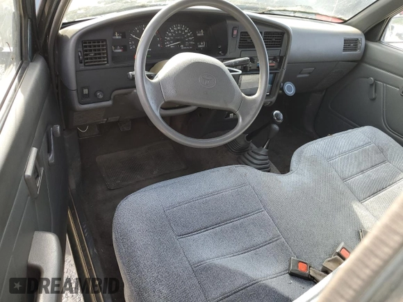 1993 Toyota Pickup DX z VIN JT4RN01P3P7060439, wystawiony jako Copart lot #57356125 z przebiegiem 259 773 mil mil oraz Szkoda całkowita • Salvage title. Historia ofert i sprzedaży dostępna na DreamBid. Obrazek 8.