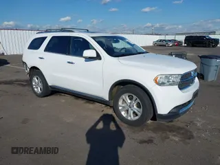 2013 Dodge Durango Crew with VIN 1C4RDJDGXDC675853, listed as a IAAI auction lot 41742767 with 101,555 mi miles. Bid and sale history available at carsss.com. Image 1.