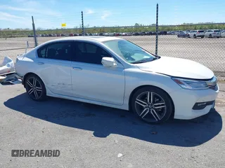 2016 Honda Accord Touring with VIN 1HGCR3F93GA024342, listed as a IAAI auction lot 41748591 with 95,253 mi miles and . Bid and sale history available at DreamBid. Image 14.