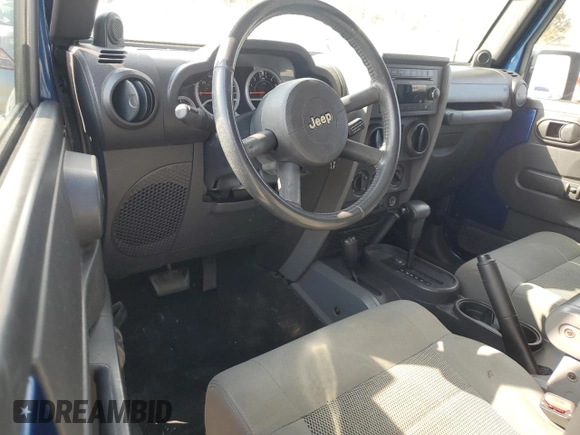 2009 Jeep Wrangler Unlimited Rubicon z VIN 1J4GA69179L763259, wystawiony jako Copart lot #44161645 z przebiegiem 153 146 mil mil oraz Szkoda całkowita • Salvage title. Historia ofert i sprzedaży dostępna na DreamBid. Obrazek 8.