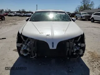 2015 Lincoln MKS с VIN 1LNHL9DK7FG605218, выставлен на аукционе Copart как лот 50882695 с пробегом 160 907 миль миль и Списание • Salvage title. История ставок и продаж доступна на DreamBid. Изображение 5.
