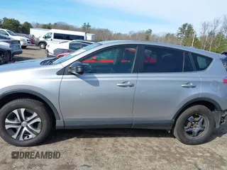 2018 Toyota RAV4 LE with VIN JTMBFREV8JJ224872, listed as a IAAI auction lot 41907962 with 104,605 mi miles and . Bid and sale history available at DreamBid. Image 14.
