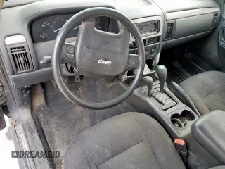 2004 Jeep Grand Cherokee Laredo z VIN 1J4GW48S54C357201, wystawiony jako Copart lot #59083985 z przebiegiem Nie podano mil oraz Nie do naprawy • Non repairable. Historia ofert i sprzedaży dostępna na DreamBid. Obrazek 8.