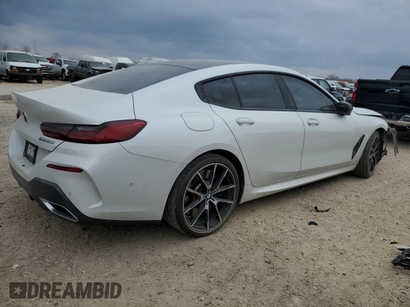 2023 BMW 8 Series M850i z VIN WBAGV8C01PCK29190, wystawiony jako Copart lot #47189205 z przebiegiem 32 691 mil mil oraz Szkoda całkowita • Salvage title. Historia ofert i sprzedaży dostępna na DreamBid. Obrazek 3.
