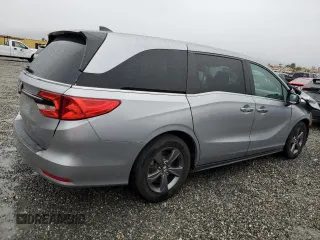 2022 Honda Odyssey EX with VIN 5FNRL6H57NB004556, listed as a Copart auction lot 49288215 with 128,460 mi miles and Salvage Title. Bid and sale history available at DreamBid. Image 3.