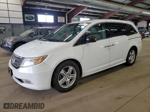 2011 Honda Odyssey Touring Elite with VIN 5FNRL5H90BB083092, listed as a Copart auction lot 54178785 with 135,765 mi miles and Salvage Title. Bid and sale history available at DreamBid. Image 1.