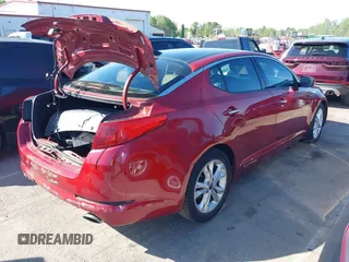 2011 Kia Optima EX with VIN KNAGN4A74B5076875, listed as a IAAI auction lot 42009937 with 190,484 mi miles and . Bid and sale history available at carsss.com. Image 4.