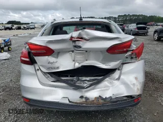 2016 Ford Focus SE with VIN 1FADP3F22GL402818, listed as a Copart auction lot 59500485 with 142,814 mi miles and Salvage title. Bid and sale history available at DreamBid. Image 6.