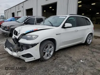 2012 BMW X5 M with VIN 5YMGY0C55CLK27404, listed as a Copart auction lot 75512644 with 0 mi miles and Salvage Title. Bid and sale history available at carsss.com. Image 1.