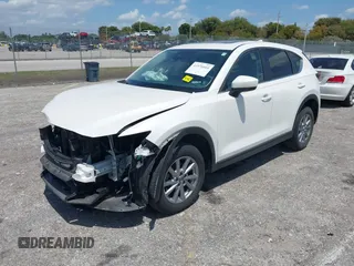 2022 Mazda CX-5 2.5 S Preferred Package with VIN JM3KFBCM1N1575573, listed as a IAAI auction lot 41976604 with 45,113 mi miles. Bid and sale history available at carsss.com. Image 2.