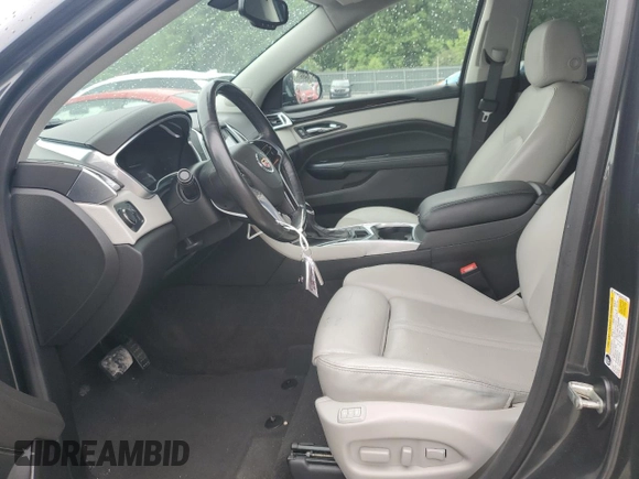 2016 Cadillac SRX Luxury Collection z VIN 3GYFNBE33GS527392, wystawiony jako Copart lot #54786465 z przebiegiem 58 327 mil mil oraz Czysty tytuł • Clean title. Historia ofert i sprzedaży dostępna na DreamBid. Obrazek 7.