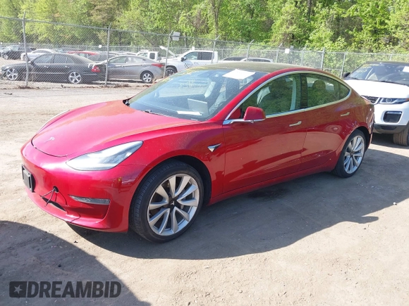 2018 Tesla Model 3 Long Range Battery z VIN 5YJ3E1EA3JF047287, wystawiony jako IAAI lot #42099771 z przebiegiem 120 470 mil mil oraz . Historia ofert i sprzedaży dostępna na DreamBid. Obrazek 19.