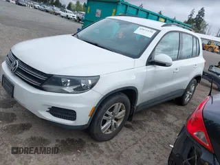 2017 Volkswagen Tiguan S with VIN WVGBV7AX5HK025695, listed as a IAAI auction lot 42071120 with 98,330 mi miles and . Bid and sale history available at DreamBid. Image 2.