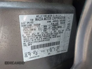 2004 Mazda Tribute LX with VIN 4F2CZ941X4KM19302, listed as a IAAI auction lot 41791389 with 123,036 mi miles. Bid and sale history available at carsss.com. Image 9.