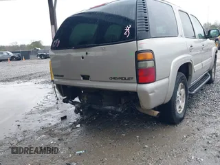 2004 Chevrolet Tahoe LT z VIN 1GNEC13Z04R309134, wystawiony jako IAAI lot #41747014 z przebiegiem Nie podano mil oraz . Historia ofert i sprzedaży dostępna na DreamBid. Obrazek 12.