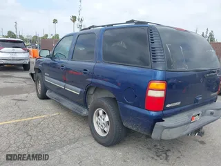 2003 Chevrolet Tahoe LS with VIN 1GNEC13T73R263893, listed as a IAAI auction lot 41906772 with 211,759 mi miles. Bid and sale history available at carsss.com. Image 3.