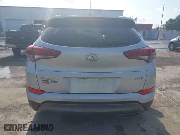 2016 Hyundai Tucson Limited with VIN KM8J33A25GU227907, listed as a IAAI auction lot 42211605 with 142,578 mi miles. Bid and sale history available at carsss.com. Image 16.
