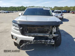 2016 Chevrolet Colorado 4WD Z71 with VIN 1GCGTDE33G1170065, listed as a Copart auction lot 55920665 with 135,410 mi miles and Salvage title. Bid and sale history available at DreamBid. Image 5.
