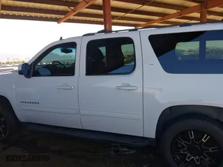 2012 Chevrolet Suburban LT with VIN 1GNSCJE05CR318556, listed as a IAAI auction lot 41654002 with 222,329 mi miles. Bid and sale history available at carsss.com. Image 15.