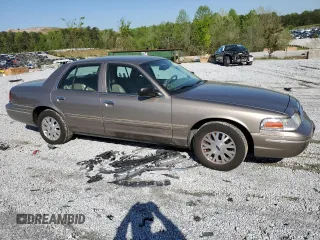 2005 Ford Crown Victoria LX z VIN 2FAFP74WX5X166506, wystawiony jako Copart lot #52141265 z przebiegiem 117 686 mil mil oraz Szkoda całkowita • Salvage title. Historia ofert i sprzedaży dostępna na DreamBid. Obrazek 4.