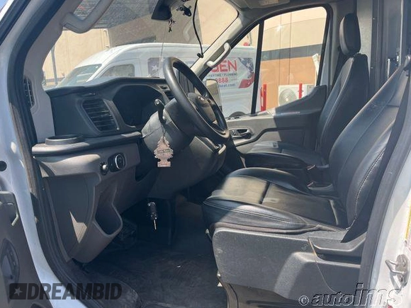2020 Ford Transit Cargo with VIN 1FTBW3X82LKB36188, listed as a IAAI auction lot 42828633 with 71,589 mi miles and . Bid and sale history available at DreamBid. Image 6.