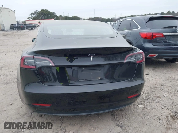 2019 Tesla Model 3 Mid Range with VIN 5YJ3E1EA5KF297213, listed as a IAAI auction lot 41361412 with 93,801 mi miles and . Bid and sale history available at carsss.com. Image 16.
